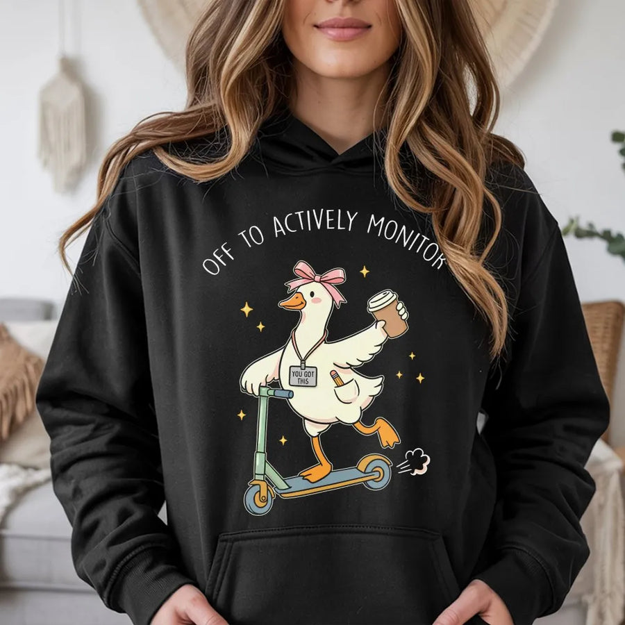 Funny Teacher Testing Shirt | Goose on Scooter 'Actively Monitor' Tee | Soft Cotton Graphic Hoodie | Test Day Proctor Gift for School Staff