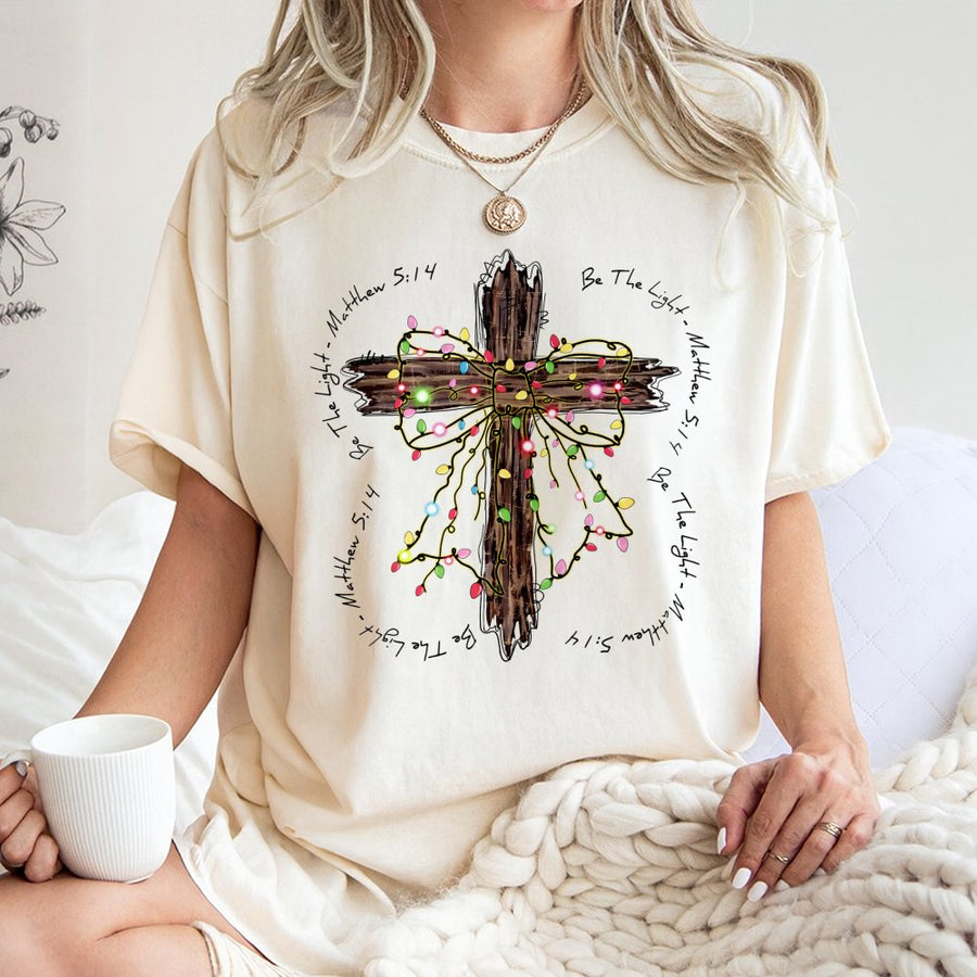 Be The Light T-Shirt | Matthew 5:14 Cross Christmas Lights Design | 100% Premium Cotton | Faithful Christian Holiday Gift for Women and Men