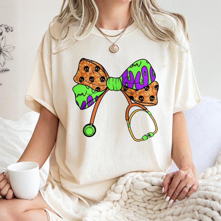 Spooky Nurse T-Shirt | Halloween Stethoscope Bow Graphic | 100% Cotton Premium Tee | Gift for RN, LPN, CNA, Nursing Students