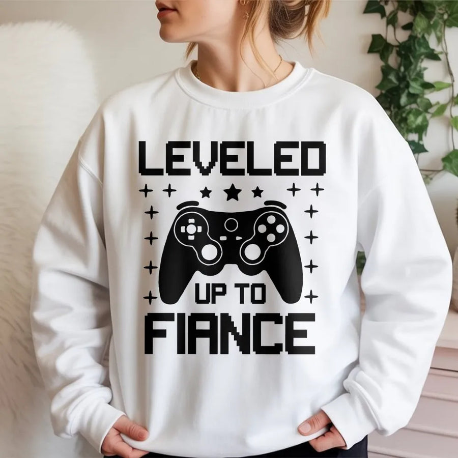 Leveled Up To Fiance Sweatshirt | Gamer Engagement Announcement Graphic | Premium Cotton Blend | Funny Gift For Future Husband Or Groom
