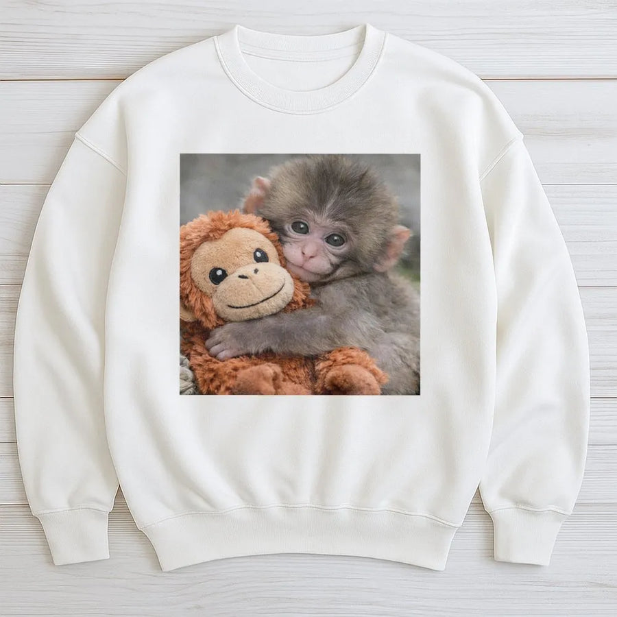 Baby Monkey Sweatshirt | Cute Monkey Hugging Plushie Graphic | Cozy Cotton-Blend Sweatshirt | Premium Gift for Animal Lovers