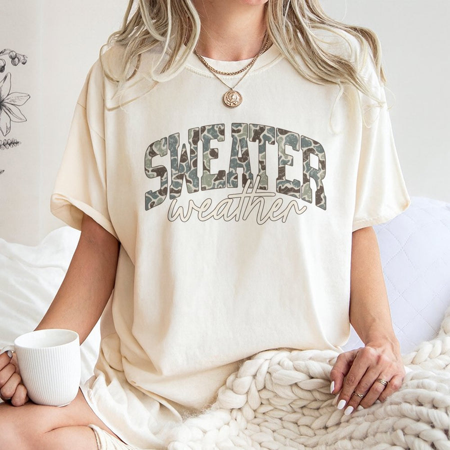 Sweater Weather Graphic T-Shirt | Camo Print Fall Typography | 100% Cotton Premium Tee | Cute Autumn Season Gift for Women and Men