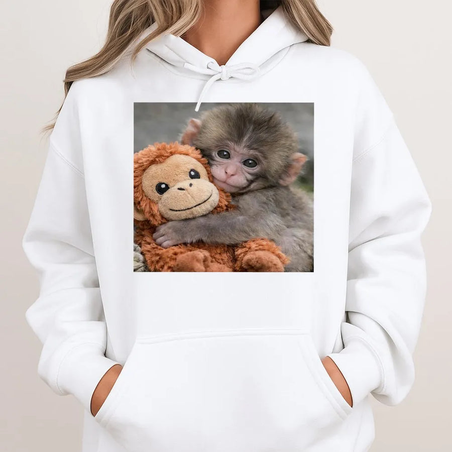 Baby Monkey Hoodie | Cute Monkey Hugging Plushie Graphic | Cozy Cotton-Blend Sweatshirt | Premium Gift for Animal Lovers