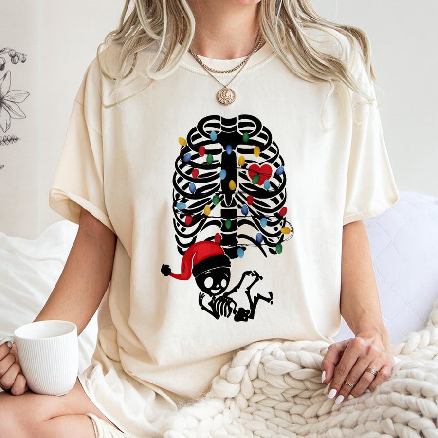 Christmas Pregnancy T-Shirt | Skeleton Baby & Xmas Lights Graphic | 100% Cotton Premium Tee | Cute Maternity Holiday Gift for Expecting Moms