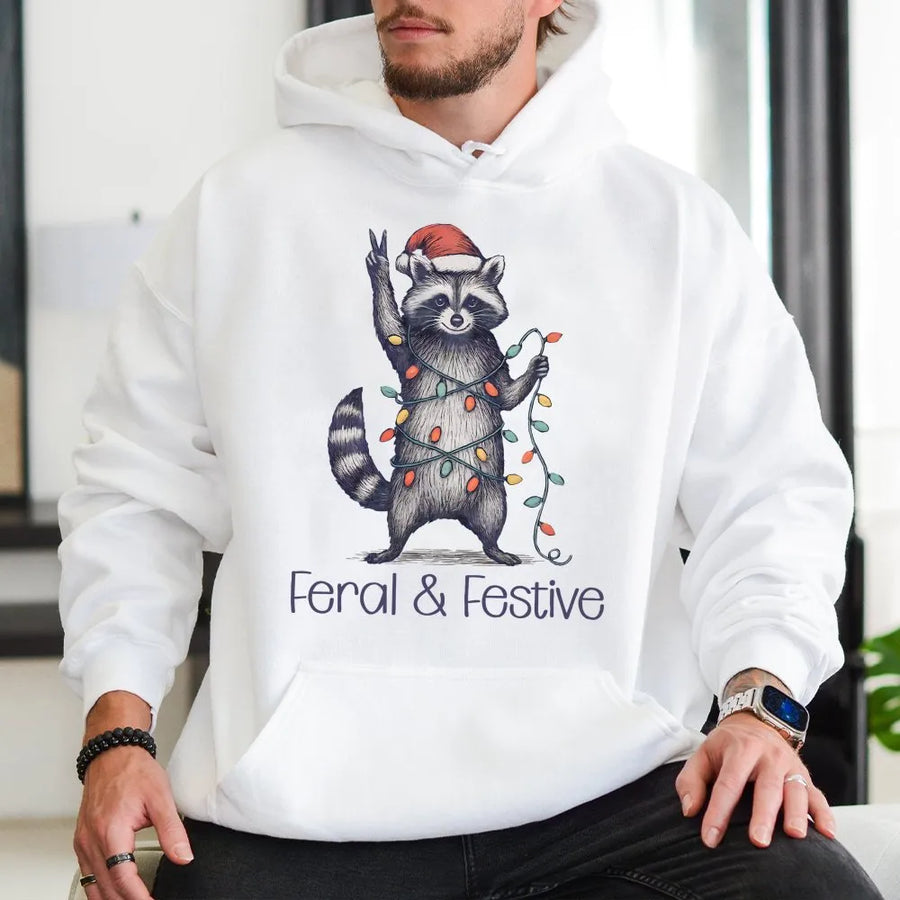 Feral and Festive Raccoon Hoodie | Funny Christmas Animal Graphic | Premium Cotton Blend Unisex Sweatshirt | Cute Holiday Gift for Raccoon Lovers
