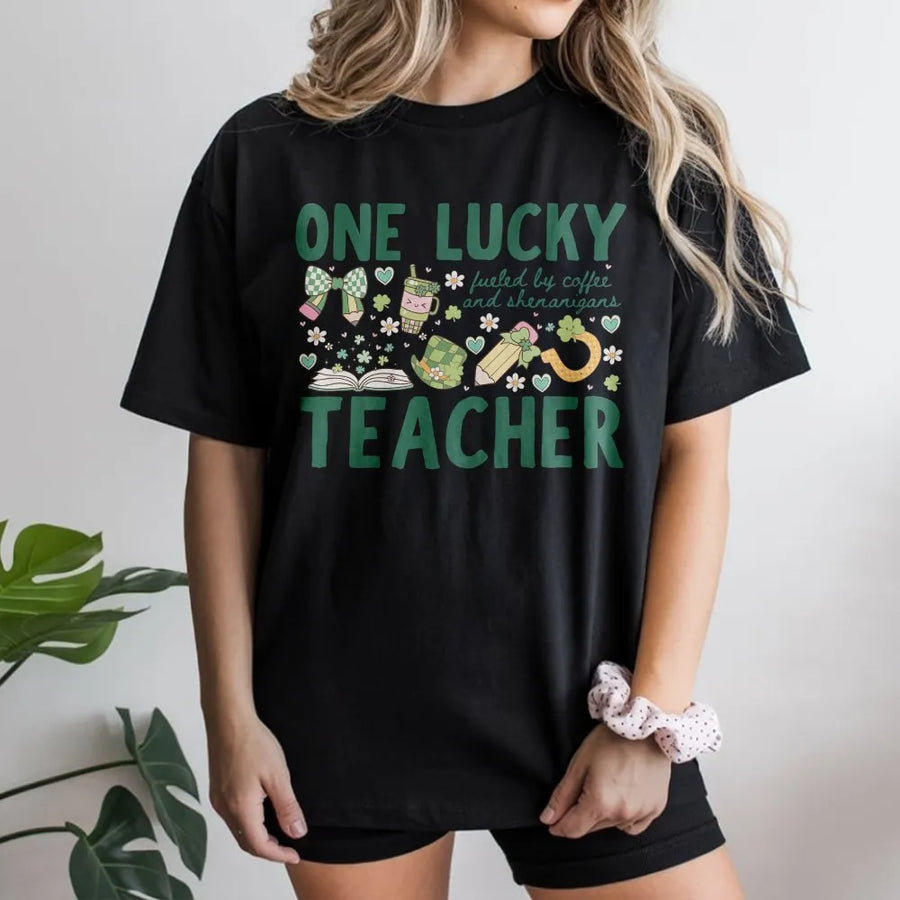 One Lucky Teacher St Patricks Day T-Shirt | Fueled By Coffee And Shenanigans Graphic | Premium Cotton Unisex Tee | Cute School Staff Gift