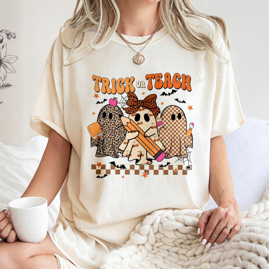 Trick Or Teach T-Shirt | Retro Leopard Ghost Teacher Halloween Graphic | 100% Cotton Premium Tee | Cute Spooky Gift for Teachers