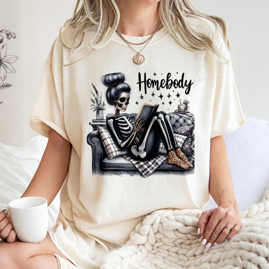 Homebody Skeleton Reading Book T-Shirt | Relaxed Aesthetic Graphic Tee | 100% Premium Cotton | Perfect Gift for Introverts & Readers