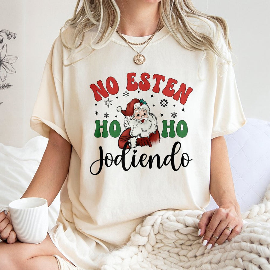 No Esten Ho Ho Jodiendo T-Shirt | Funny Latino Christmas Graphic Tee | 100% Premium Cotton | Humorous Spanish Holiday Gift for Men and Women