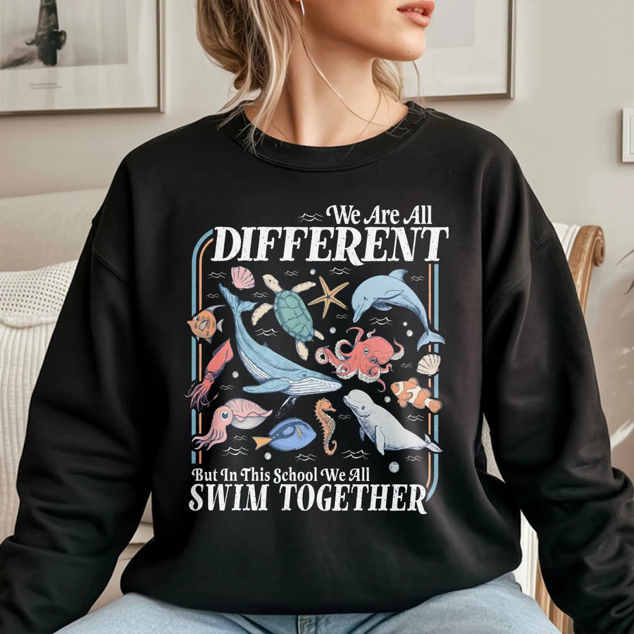 We Are All Different Swim Together Sweatshirt | Inclusive Ocean Life Graphic Tee | Soft Cotton Blend Unisex Pullover | Teacher Gift Back to School