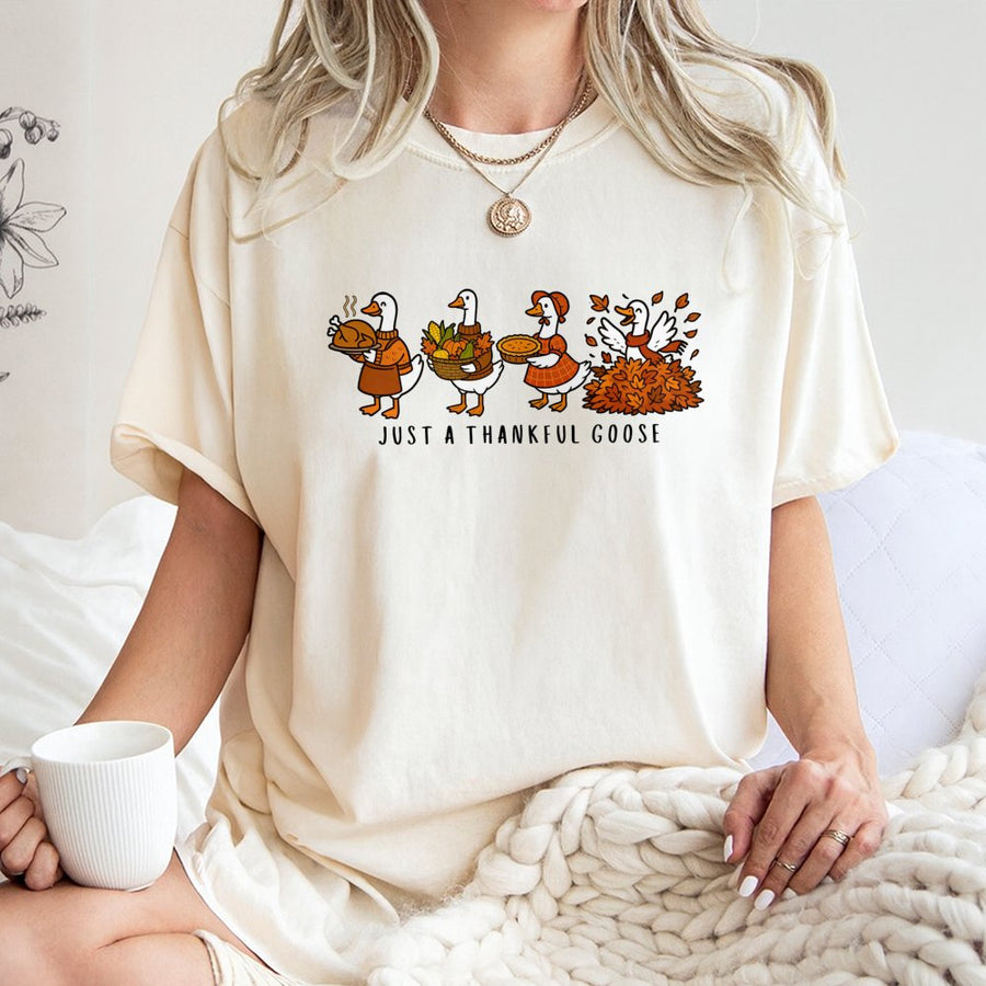 Just A Thankful Goose T-Shirt | Funny Thanksgiving Animal Graphic | 100% Cotton Premium Soft Tee | Cute Fall Outfit For Family Gathering