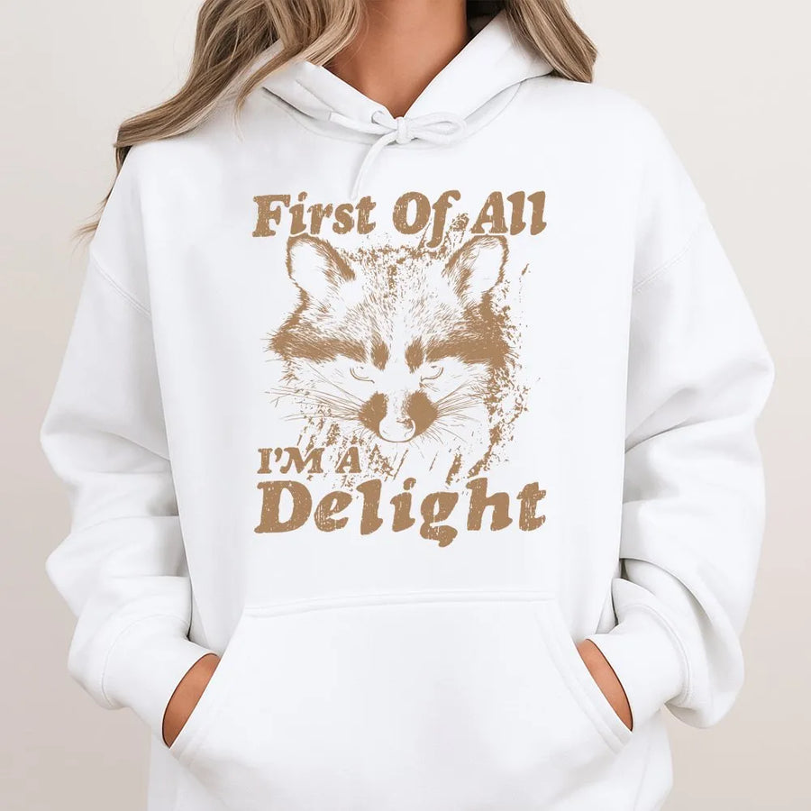 Funny Raccoon Hoodie | 'First Of All I'm A Delight' Graphic | Cozy Crewneck Pullover | Sarcastic Humor Gift for Raccoon Lovers