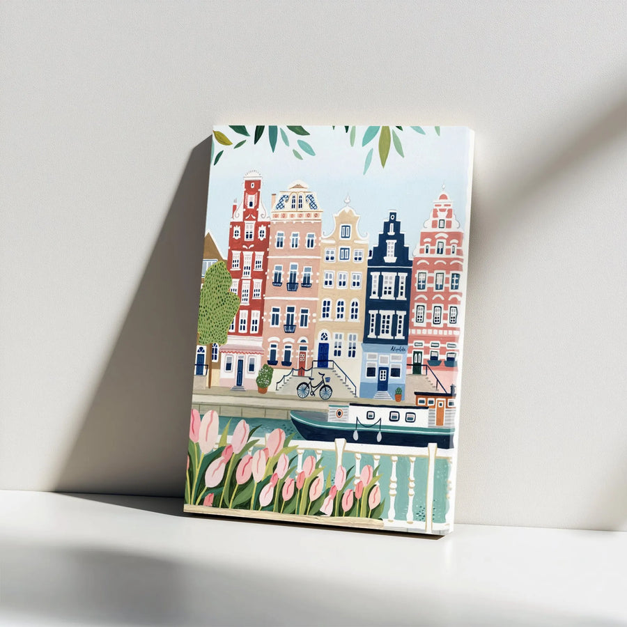 Amsterdam Canal House Canvas Print | Whimsical Cityscape With Tulips & Houseboat | Gallery Wrapped 1.25" Premium Wood Frame | Travel Inspired Home Decor Wall Art
