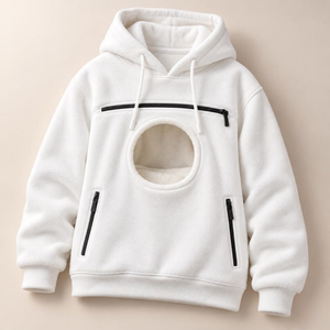 Flat lay of the white pet carrier hoodie: chest zip, round pouch opening with fleece lining, two zip side pockets