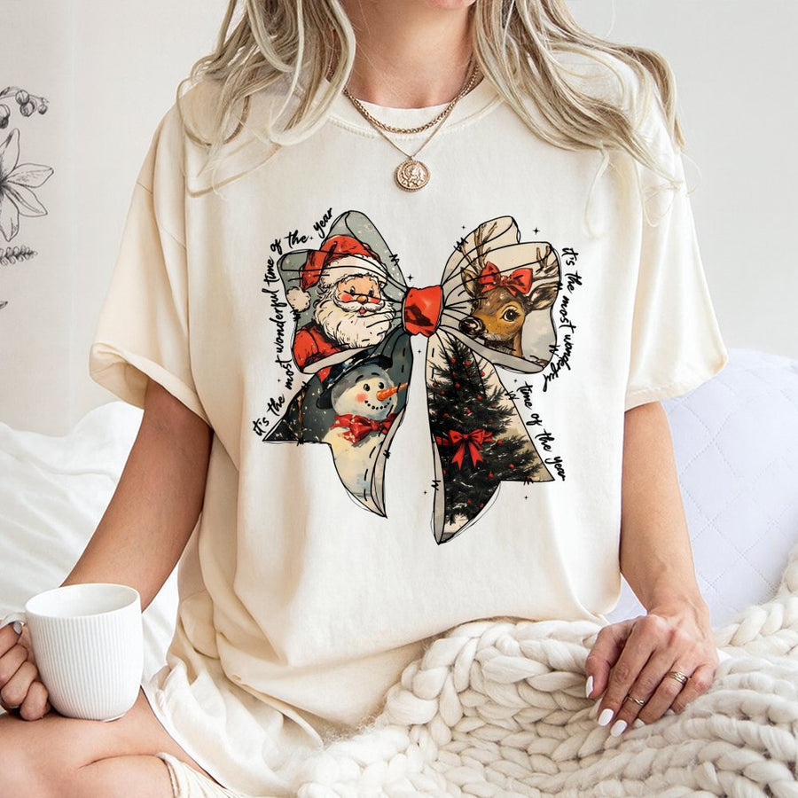 Christmas Coquette Bow T-Shirt | Retro Holiday Santa & Reindeer Graphic | 100% Cotton Premium Tee | Festive Gift for Women & Christmas Lovers