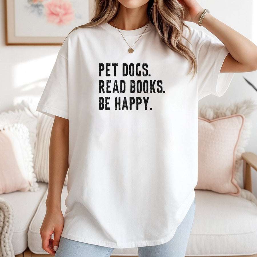 Pet Dogs Read Books Be Happy T-Shirt | Funny Dog Lover Graphic Tee | 100% Cotton Premium Apparel | Cute Bookworm Gift for Readers