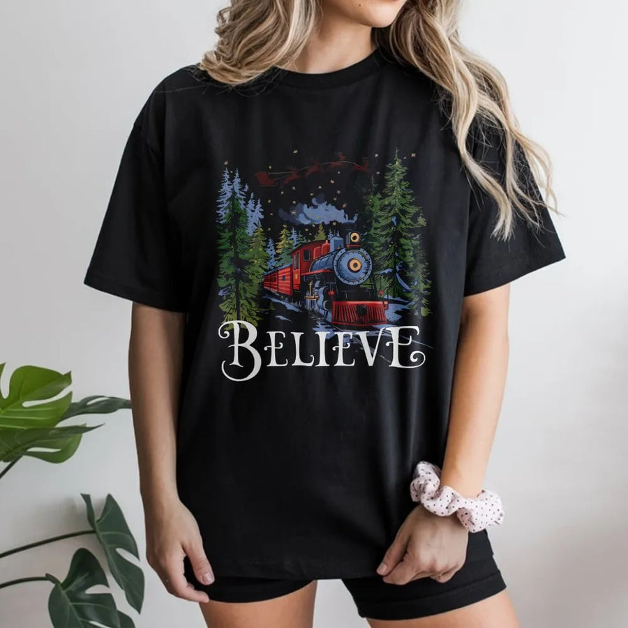 Believe Christmas Train T-Shirt | Retro Winter Forest Graphic Tee | Premium 100% Cotton Apparel | Festive Holiday Gift for Train Lovers