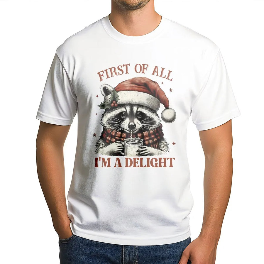 Funny Raccoon Christmas T-Shirt | First Of All I'm A Delight Quote | Premium Cotton Graphic Tee | Cute Animal Holiday Gift For Raccoon Lovers