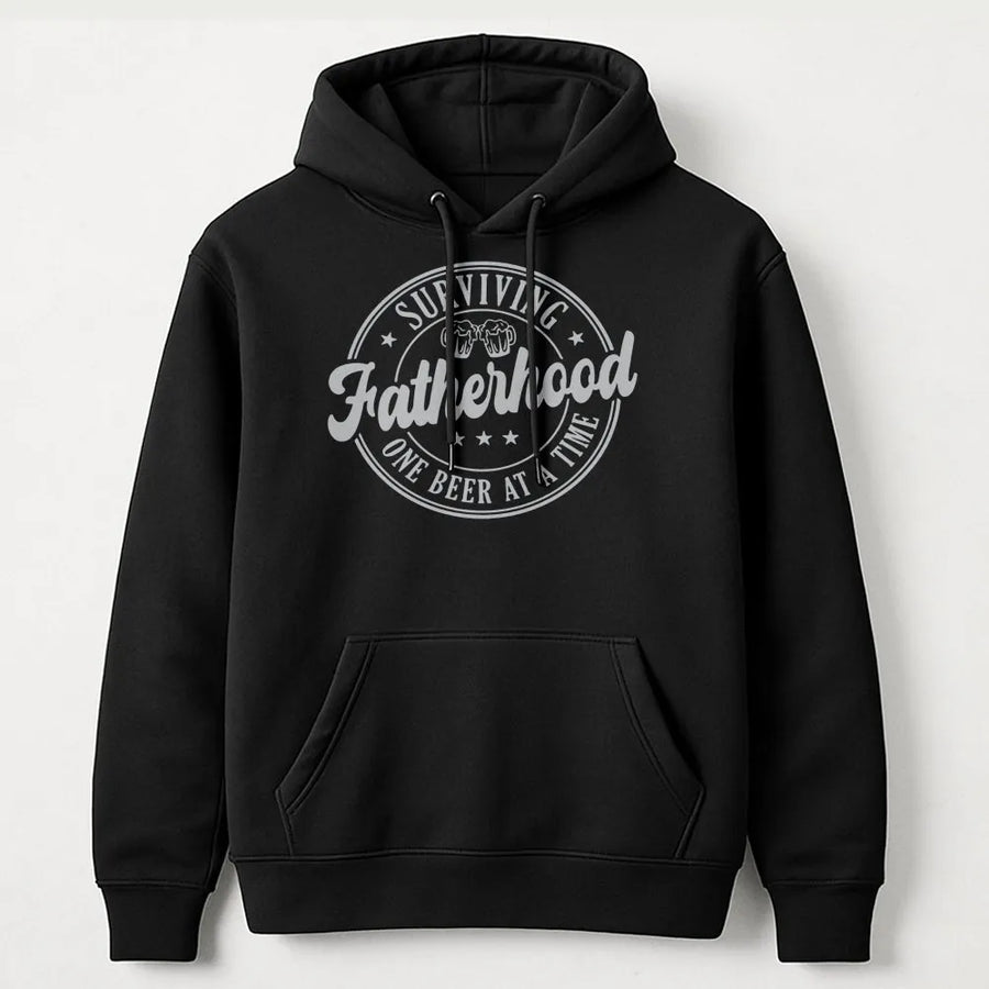 Surviving Fatherhood Hoodie | Funny Beer Lover Graphic Print | Premium Cotton-Blend Pullover | Unique Dad Gift For Father's Day 2026 Birthday
