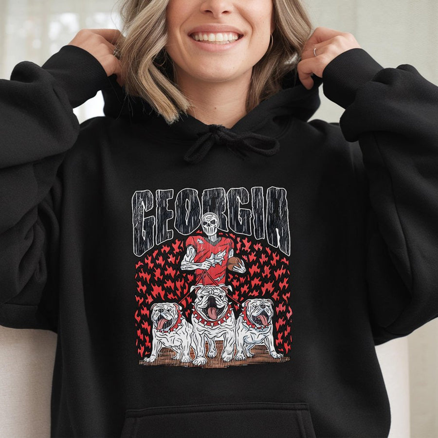 Georgia With A Skeletal Football Player Holding A Football, Three Bulldogs, And Flames Hoodie