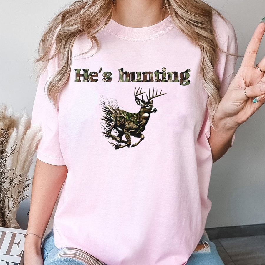 He's Hunting Deer T-Shirt | Camo Whitetail Buck Graphic | Premium 100% Cotton | Gift for Hunters and Outdoorsmen