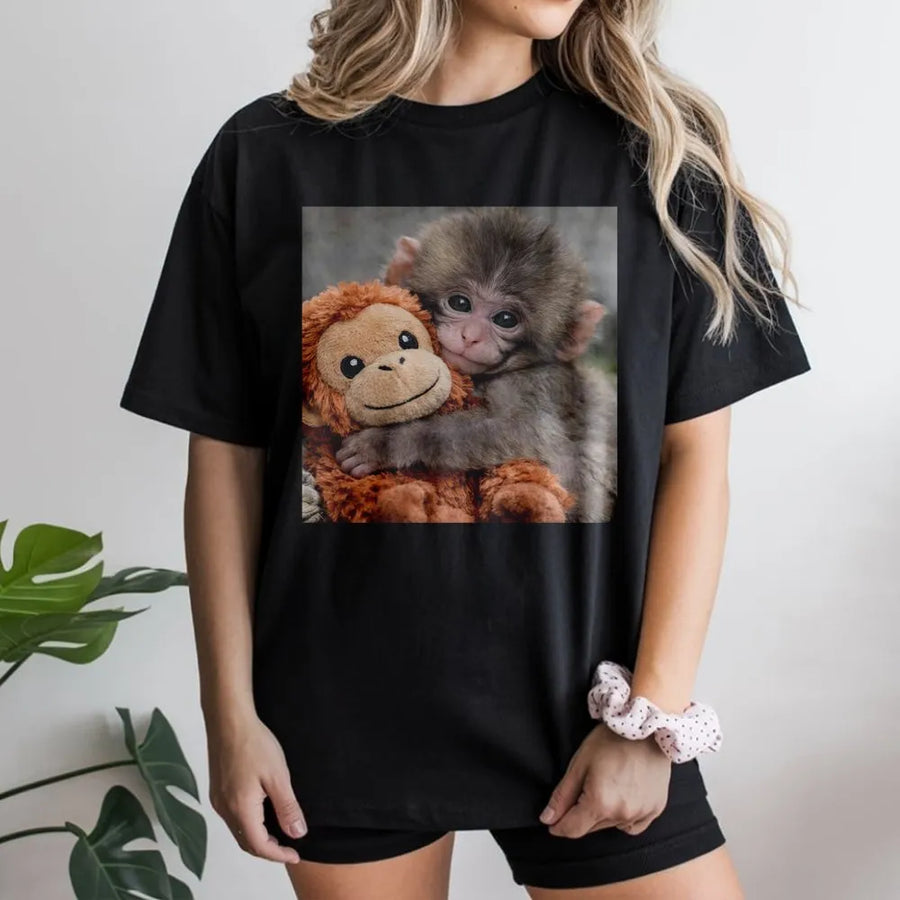 Baby Monkey T-Shirt | Cute Monkey Hugging Plushie Graphic | Cozy Cotton-Blend Sweatshirt | Premium Gift for Animal Lovers
