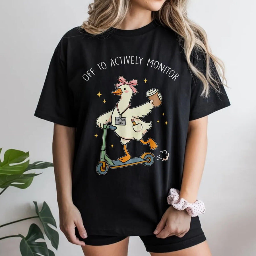 Funny Teacher Testing Shirt | Goose on Scooter 'Actively Monitor' Tee | Soft Cotton Graphic T-Shirt | Test Day Proctor Gift for School Staff