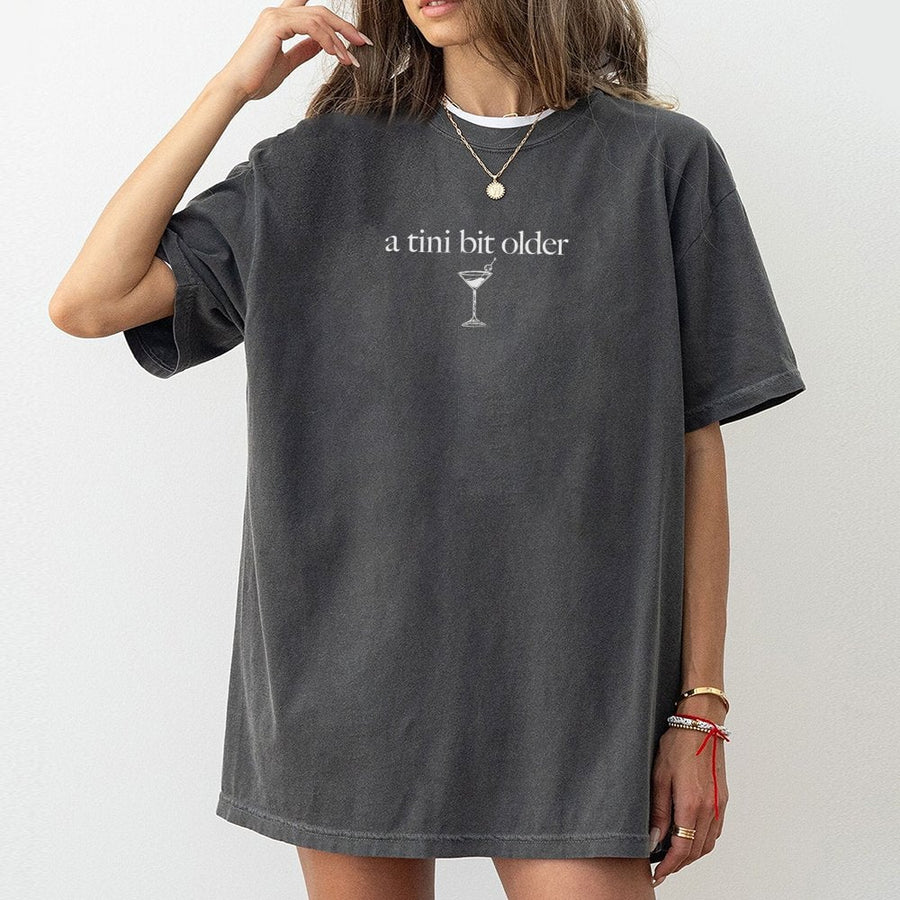 A Tini Bit Older T-Shirt | Funny Martini Birthday Graphic | 100% Cotton Premium Tee | Unique Alcohol Humor Gift for Women and Men