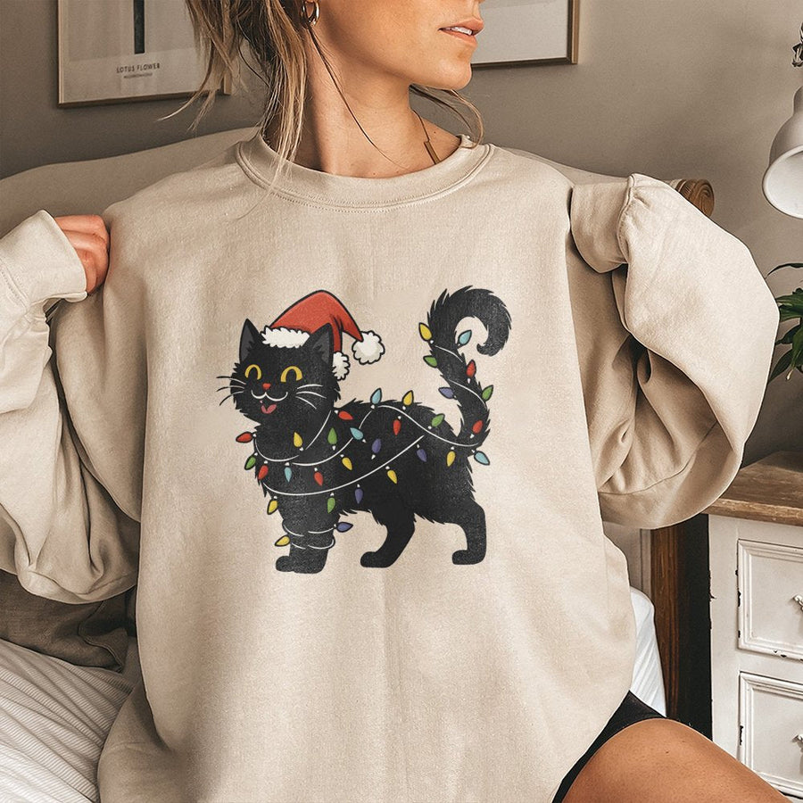 Black Cat Christmas Sweatshirt | Cute Kitten Tangled In Holiday Lights | Premium Cotton Blend | Funny Winter Gift For Cat Lovers
