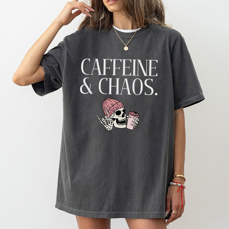 Caffeine & Chaos Graphic T-Shirt | Skeleton In Pink Beanie Drinking Coffee | 100% Cotton Premium Tee | Fun Aesthetic Gift For Coffee Lovers