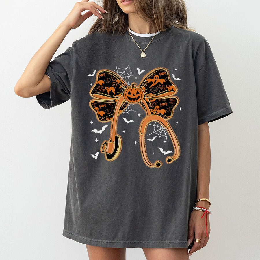 Halloween Nurse T-Shirt | Pumpkin Bow Stethoscope Graphic | Premium Soft Cotton | Spooky Gift for RNs and Healthcare Workers