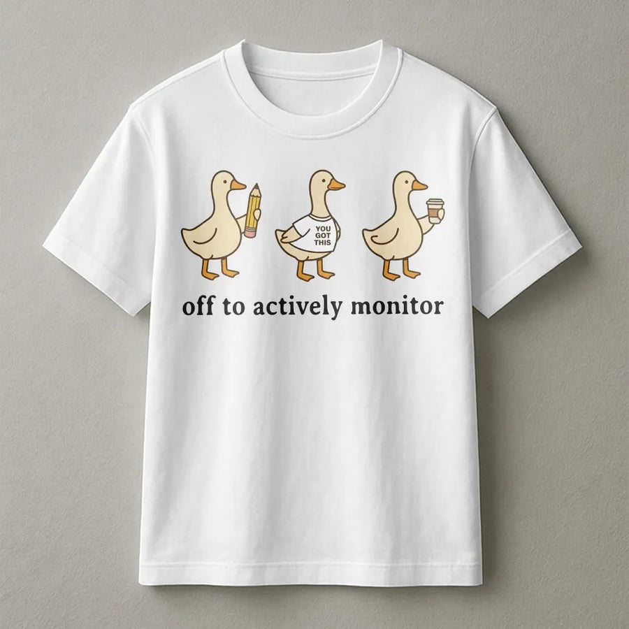Actively Monitor Duck T-Shirt | Funny Cartoon Ducks Slogan | Premium Cotton-Blend Sweatshirt | Sarcastic Office Humor Gift for Teacher or Nurse