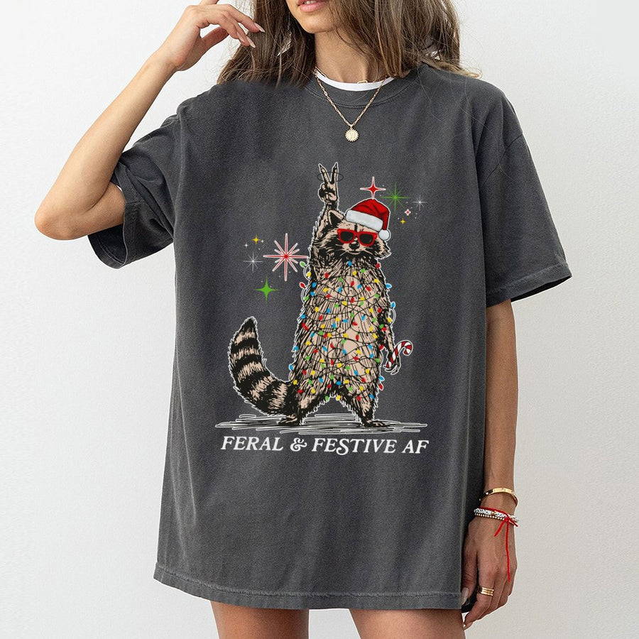 Feral and Festive AF Raccoon T-Shirt | Funny Tangled Christmas Lights Graphic | Premium Cotton Unisex Tee | Unique Ugly Christmas Party Gift