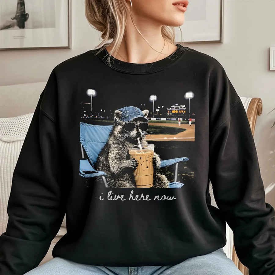 Funny Raccoon Baseball Sweatshirt | 'I Live Here Now' Graphic Tee | Soft Cotton Unisex Tee | Gift for Baseball Mom or Softball Dad Tournament Fan