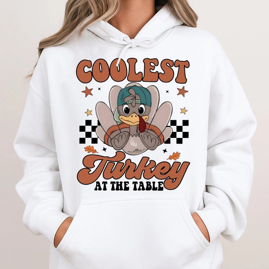 Coolest Turkey At The Table Hoodie | Retro Thanksgiving Cartoon Graphic | Premium Cotton-Poly Blend | Funny Fall Holiday Gift For Family