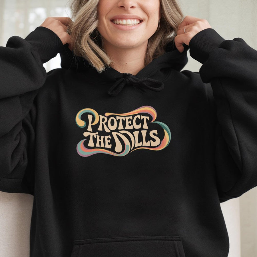 Protect The Dolls Hoodie | Retro Groovy Feminist Graphic Print | Soft Cotton-Blend Premium Apparel | Empowerment Gift For Women & Best Friends