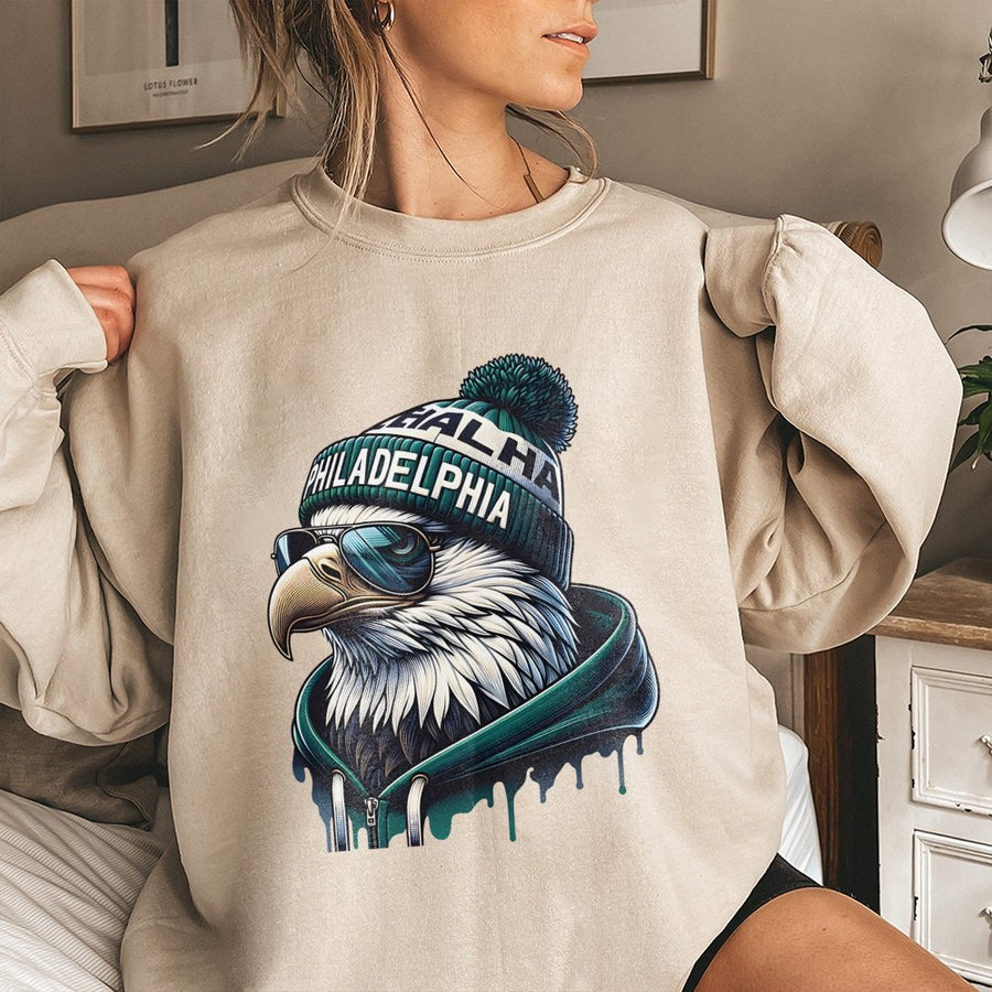 Philadelphia Eagle Wearing A Beanie, Sunglasses, And A Sweatshirt