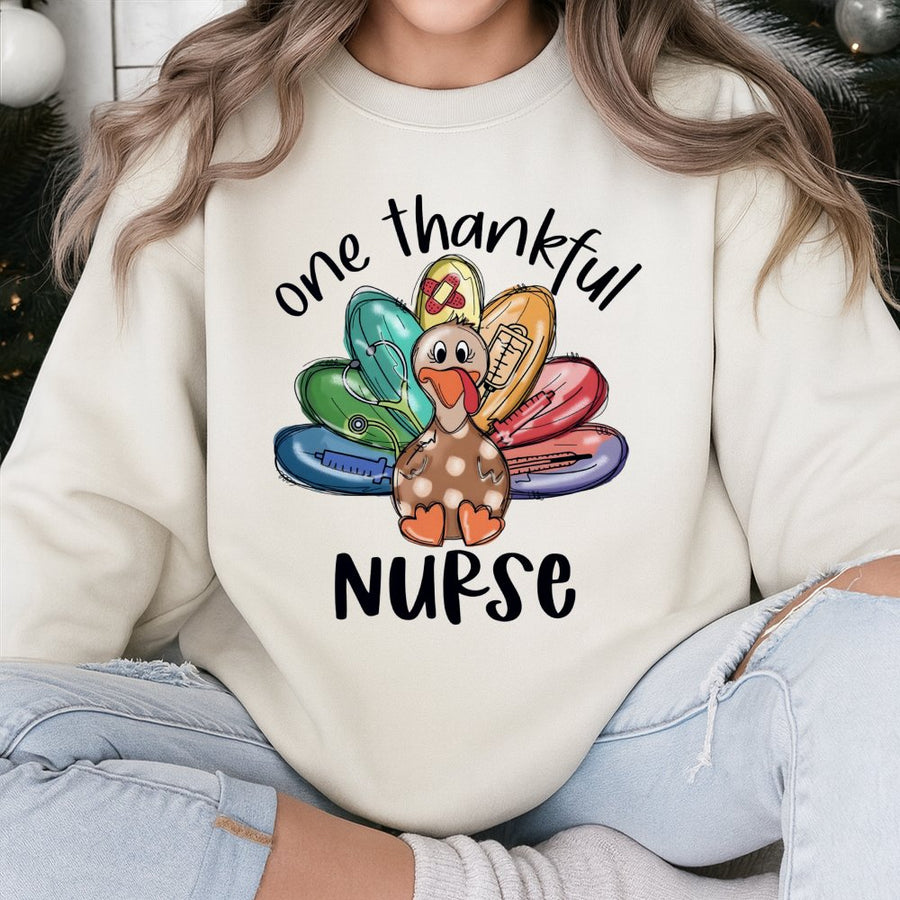 One Thankful Nurse Sweatshirt | Thanksgiving Turkey Medical Graphic | Soft Cotton Blend Crewneck | Gift for Registered Nurse & Nursing Student