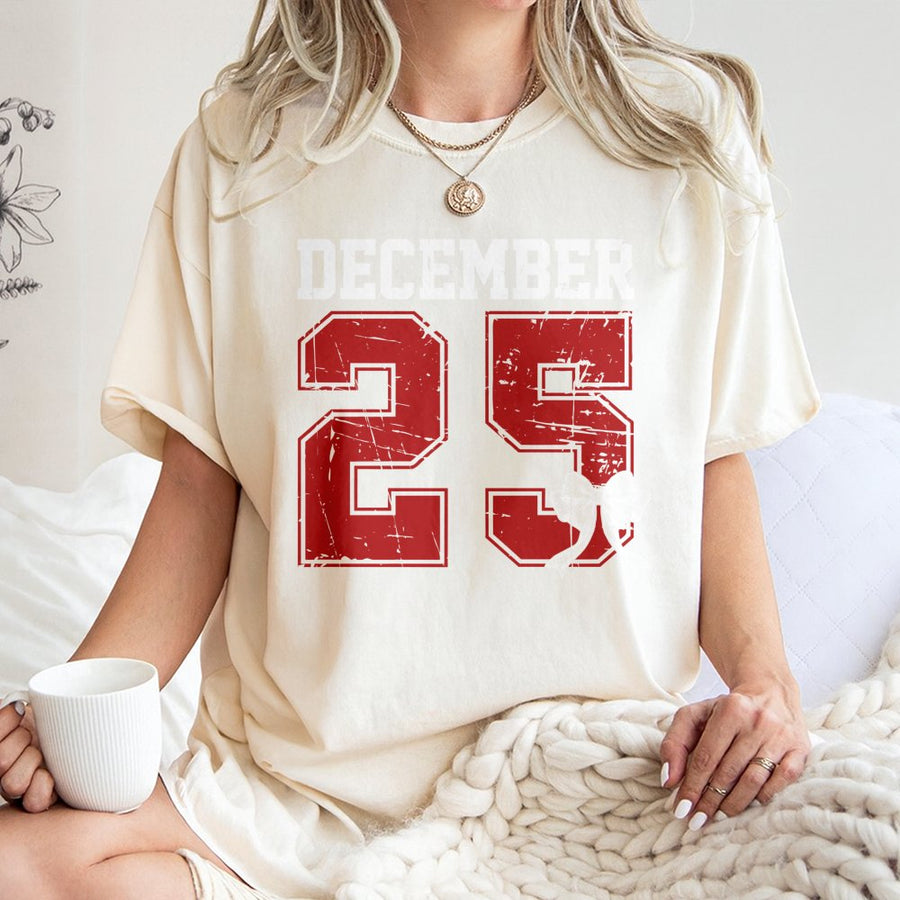 December 25 Christmas T-Shirt | Distressed Varsity Style Holiday Graphic | 100% Soft Cotton | Unisex Festive Gift for Family and Friends
