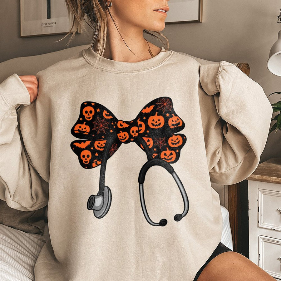 Halloween Nurse Sweatshirt | Spooky Stethoscope Coquette Bow Graphic | Premium Cotton Blend | Gift for Nurses and Nursing Students