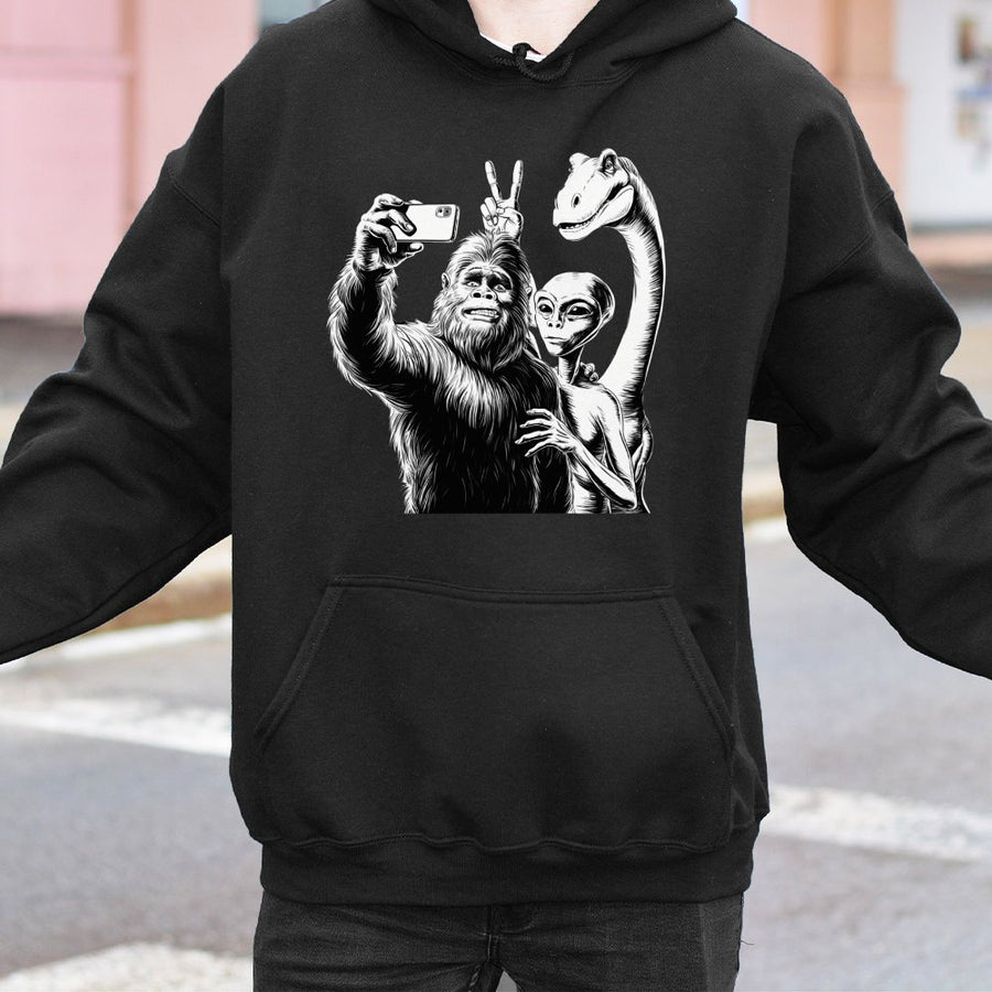Bigfoot Alien Selfie Hoodie | Funny Cryptid Dinosaur Graphic | Premium Cotton Blend Pullover | Unique Gift For Sci-Fi Lovers