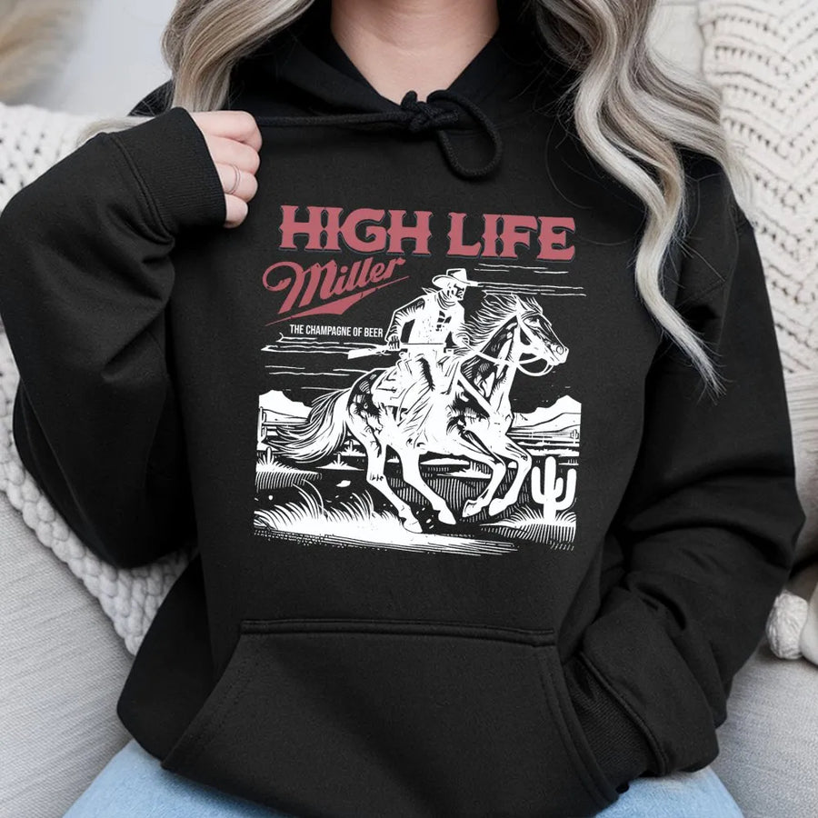 Miller High Life Hoodie - Featuring Front Red Miller Logo, And Back Graphic Of Cowboy On Horse In Desert Scene With The Champagne