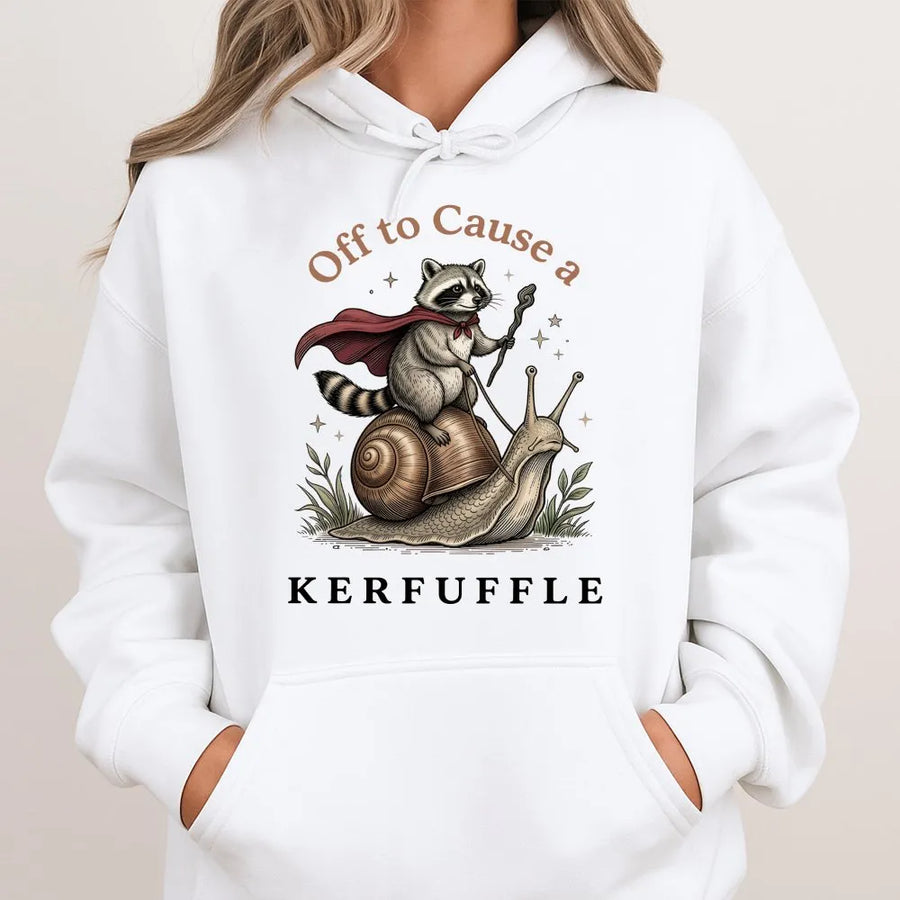 Raccoon Riding Snail Hoodie | Off To Cause A Kerfuffle Funny Graphic | Premium Cotton Blend | Whimsical Gift For Nature And Animal Lovers