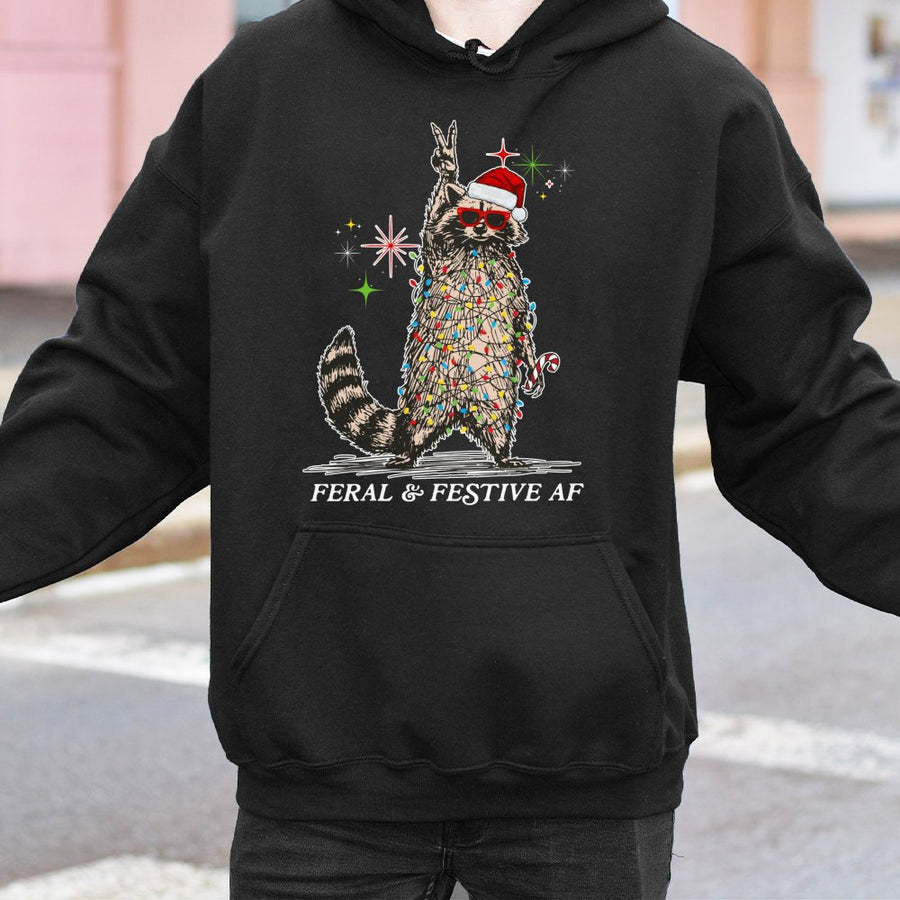 Feral & Festive Raccoon Hoodie | Funny Tangled Lights Graphic | Premium Cotton Blend | Unhinged Ugly Christmas Sweatshirt Gift for Him or Her