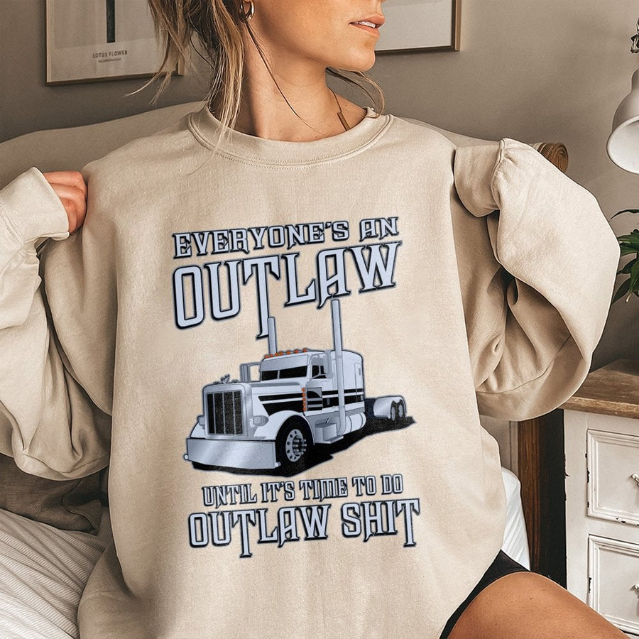 Outlaw Trucker Sweatshirt | Everyone's An Outlaw Graphic Print | Premium Cotton-Blend Apparel | Gift For Truck Drivers And Semi Truck Enthusiasts