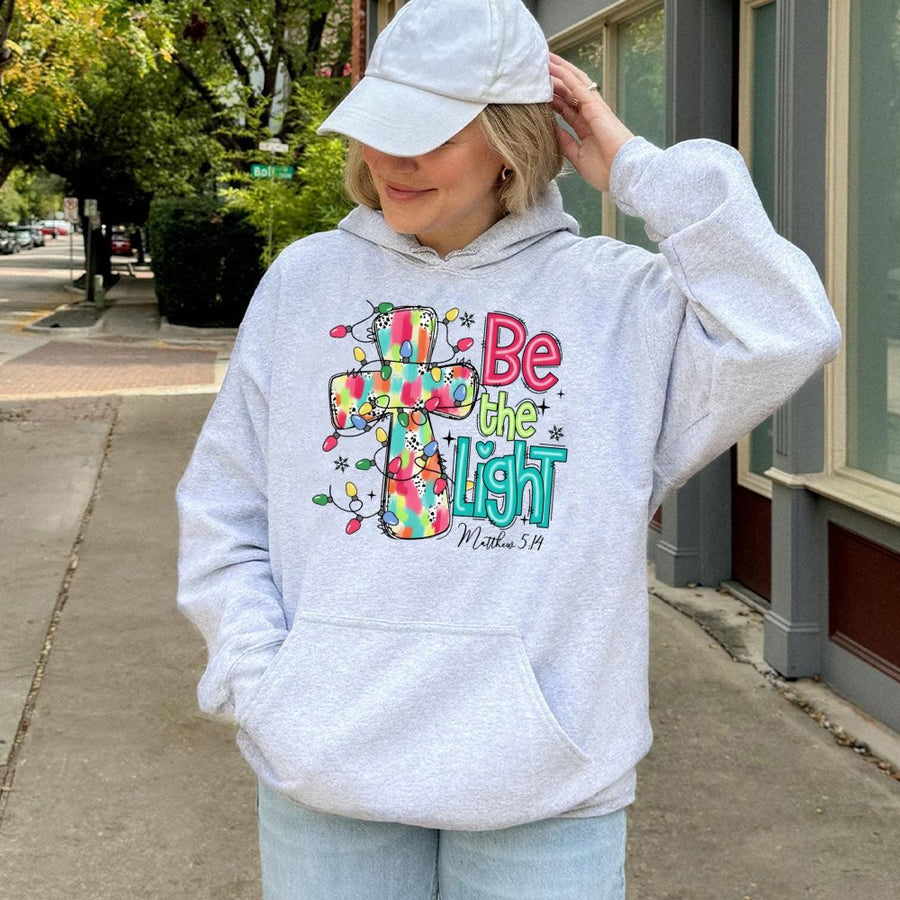 Be The Light Hoodie | Christian Christmas Cross Design | Premium Cotton-Blend Fleece | Religious Faith Gift for Women and Men