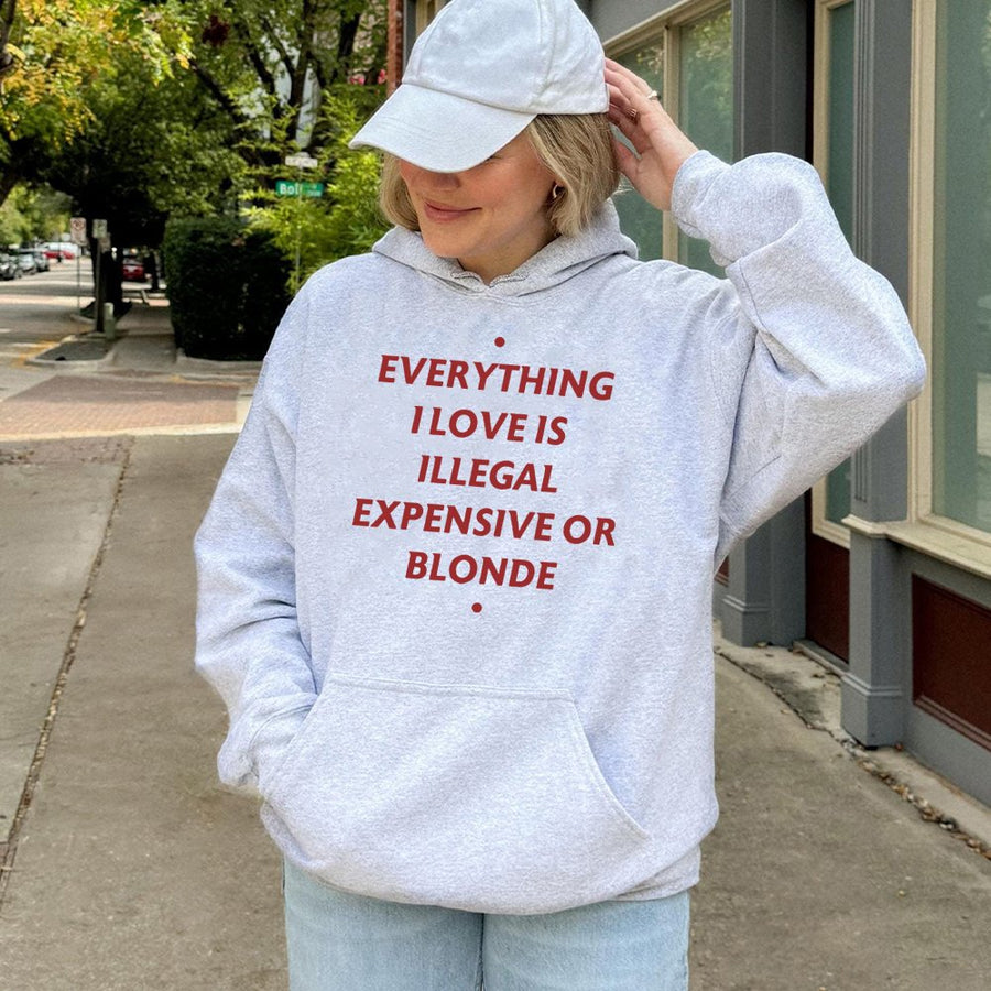 Everything I Love Is Illegal Expensive Or Blonde Hoodie | Sarcastic Quote Graphic Sweatshirt | Cotton-Poly Blend | Unisex Gift For Blonde Friends