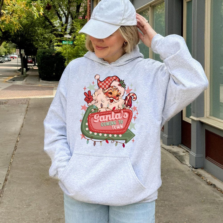 Retro Santa Hoodie | Santa’s Coming To Town Graphic Print | Premium Cotton-Blend | Festive Christmas Gift for Holiday Lovers