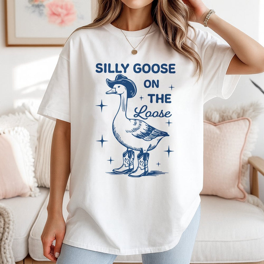 Silly Goose On The Loose T-Shirt | Cowboy Goose With Boots Design | Premium 100% Cotton Apparel | Funny Animal Humor Gift For Men And Women