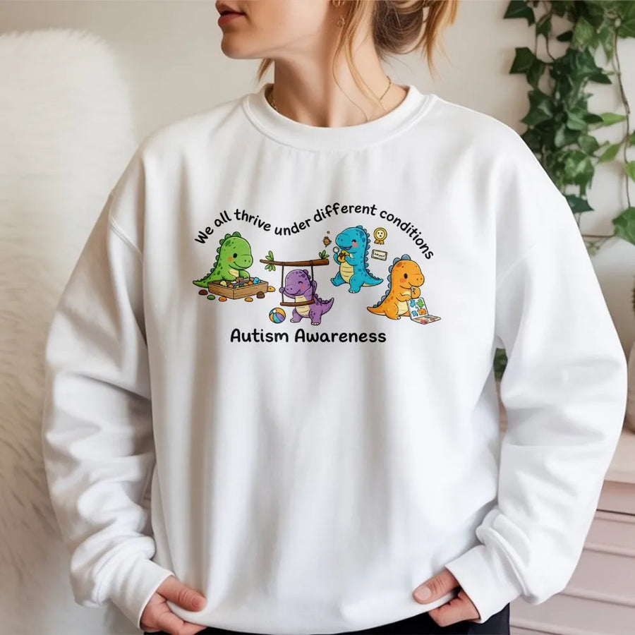 Autism Awareness Dinosaur Sweatshirt | We All Thrive Under Different Conditions | Soft Unisex Pullover | SPED Teacher Inclusion Gift